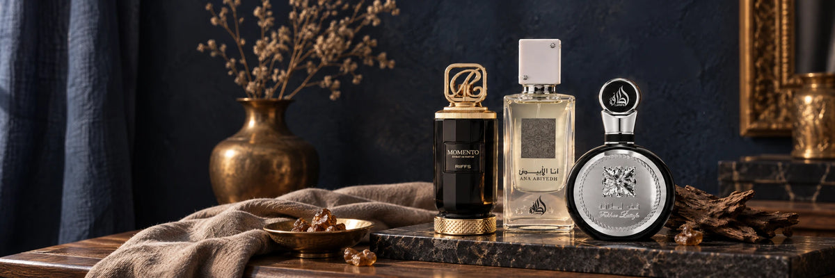 Arabische parfums van Riiffs en Lattafa op een marmeren plateau met amber en oud